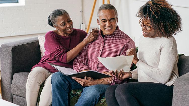 A couple talking to their financial professional.